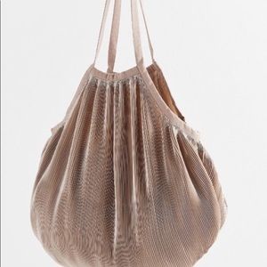 Urban Outfitters silver purse, pleats